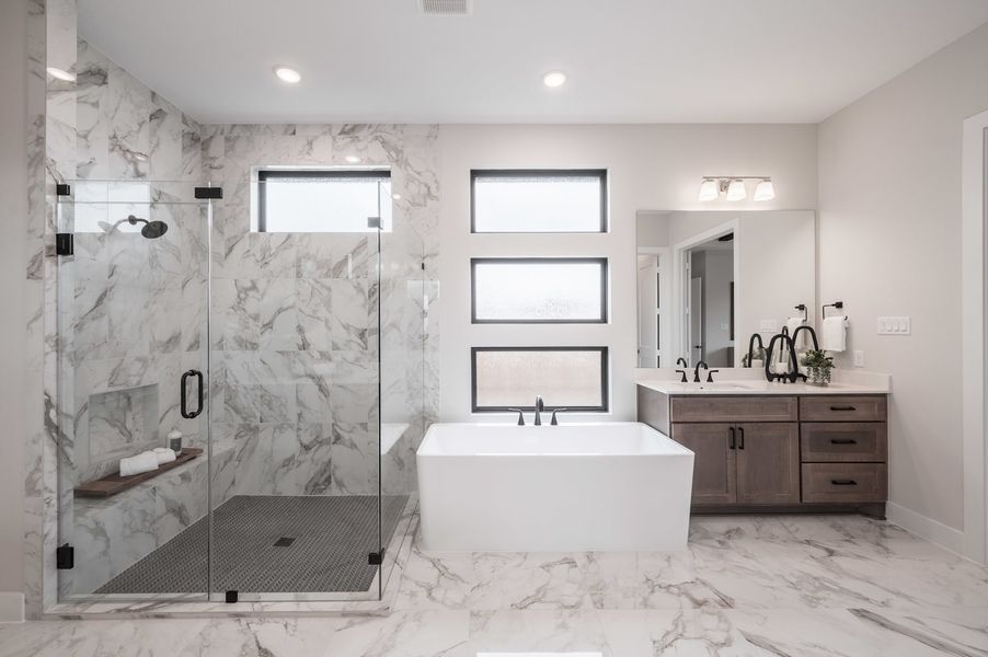 Representative furnished interior of a home built from the Carignan by Tri Pointe Homes in Woodson’s Reserve, Spring (Image 58).