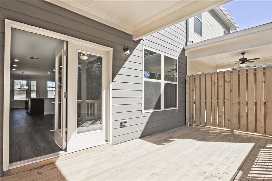 Exterior details and patio area of a home in Towns at Enclave, Lawrenceville (Image 3).