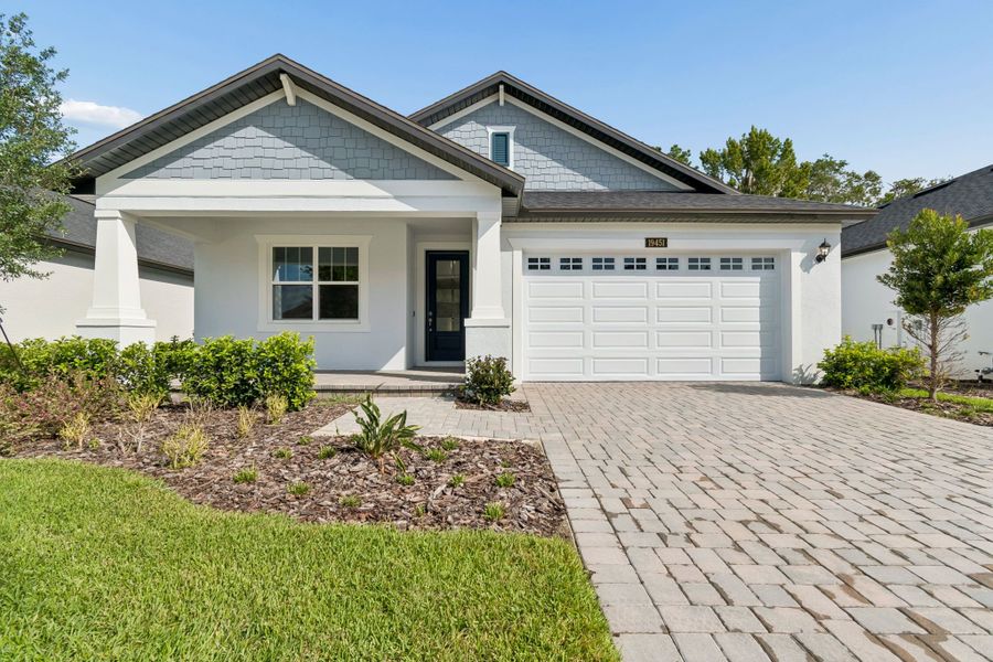 Front exterior of a new home in Southern Hills Plantation, Brooksville, FL, highlighting curb appeal (Image 23).