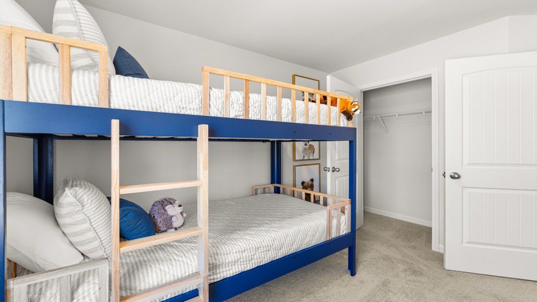 Representative furnished interior of a home built from the ADDINGTON by D.R. Horton in Waypoint, Flowery Branch (Image 29).