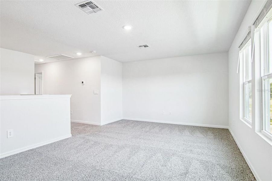 Spacious, unfurnished interior of a new home in Two Rivers - Classic Series, Zephyrhills (Image 18).