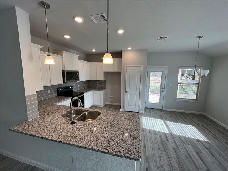 Furnished interior view inside a new home in Delaware Springs, Burnet (Image 5). Furnished interior view inside a new home in Delaware Springs, Burnet (Image 5).