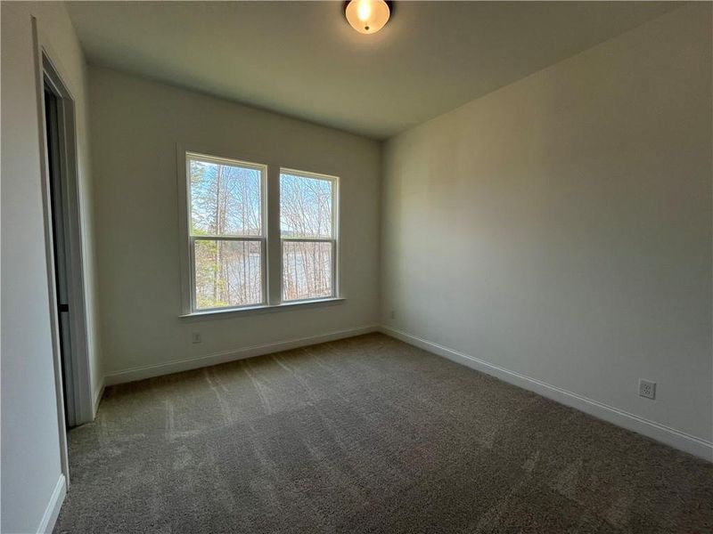 Spacious, unfurnished interior of a new home in East Harbor II at Chestatee, Dawsonville (Image 21).