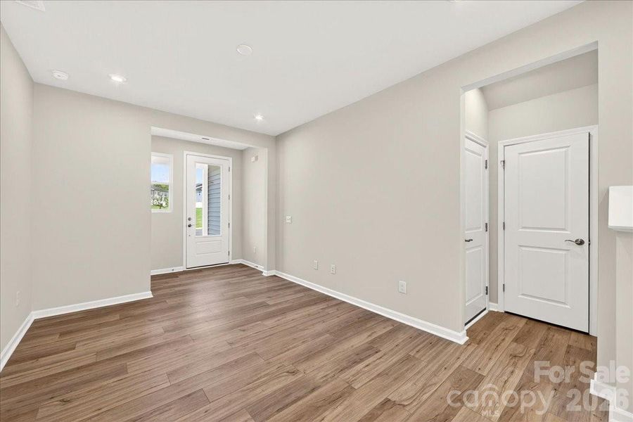 Coat closet and garage access Coat closet and garage access