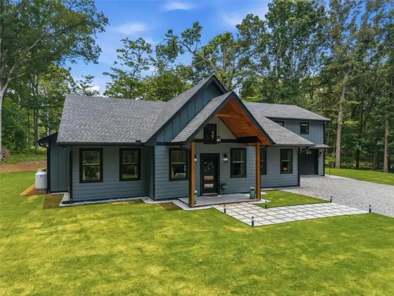 Front exterior of a new home in , Ellijay, GA, highlighting curb appeal (Image 2). Front exterior of a new home in , Ellijay, GA, highlighting curb appeal (Image 2).