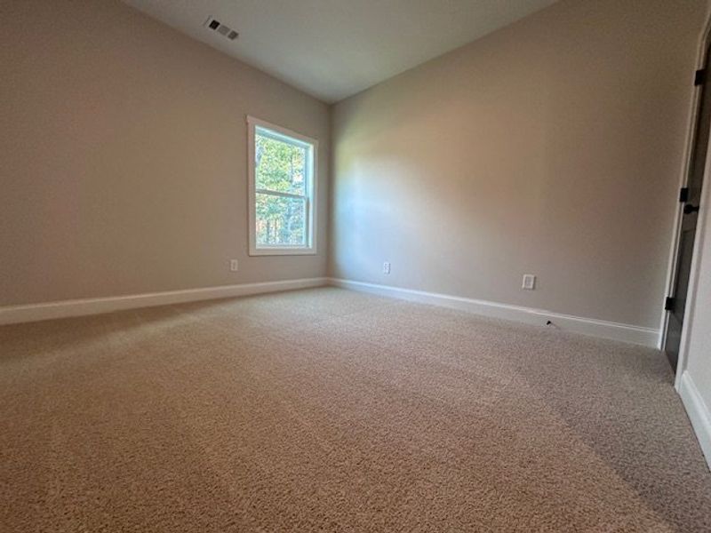 Spacious, unfurnished interior of a new home in Deer Creek, Moreland (Image 12).