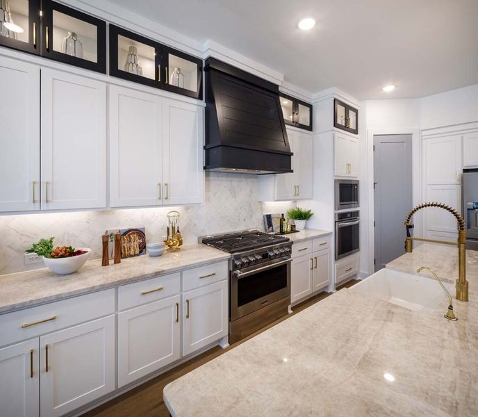 Representative furnished interior of a home built from the 222G by Highland Homes in Santa Rita Ranch, Liberty Hill (Image 11).