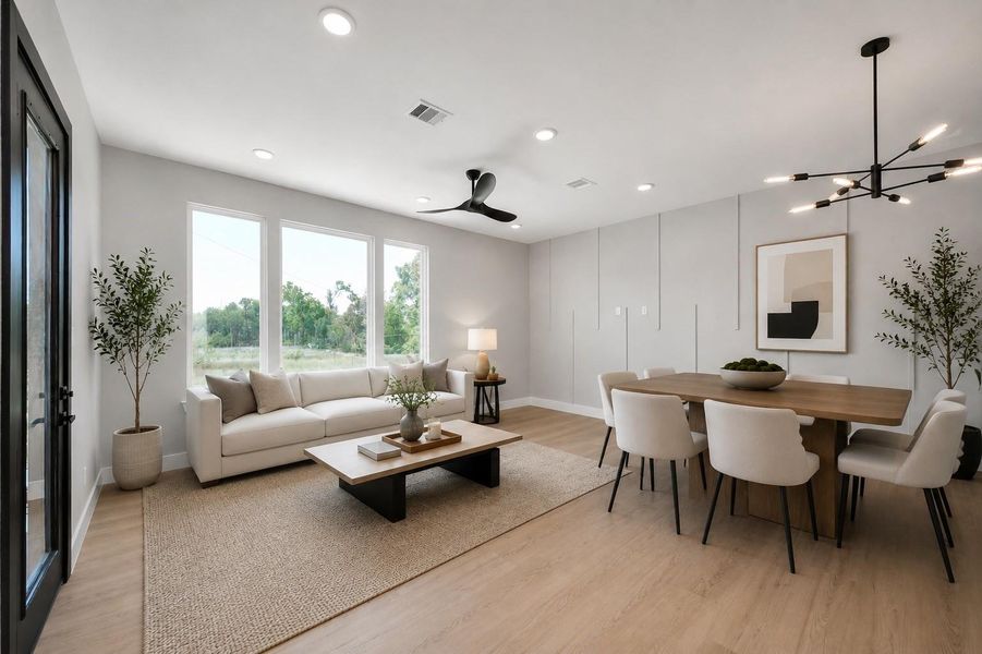 Bright & inviting living space featuring modern finishes, oversized windows, & warm contemporary design with direct balcony access.