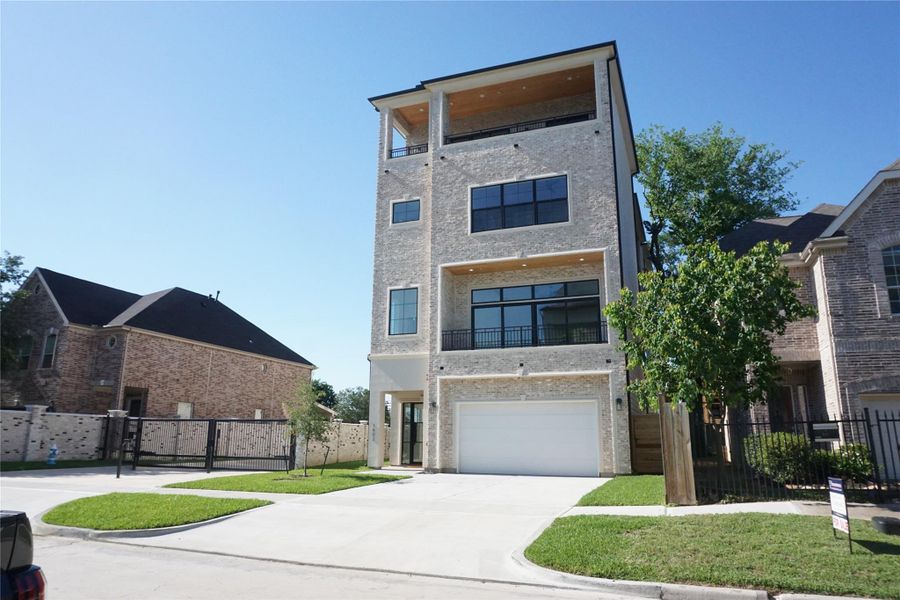 Front exterior of a new home in , Houston, TX, highlighting curb appeal (Image 24). Front exterior of a new home in , Houston, TX, highlighting curb appeal (Image 24).