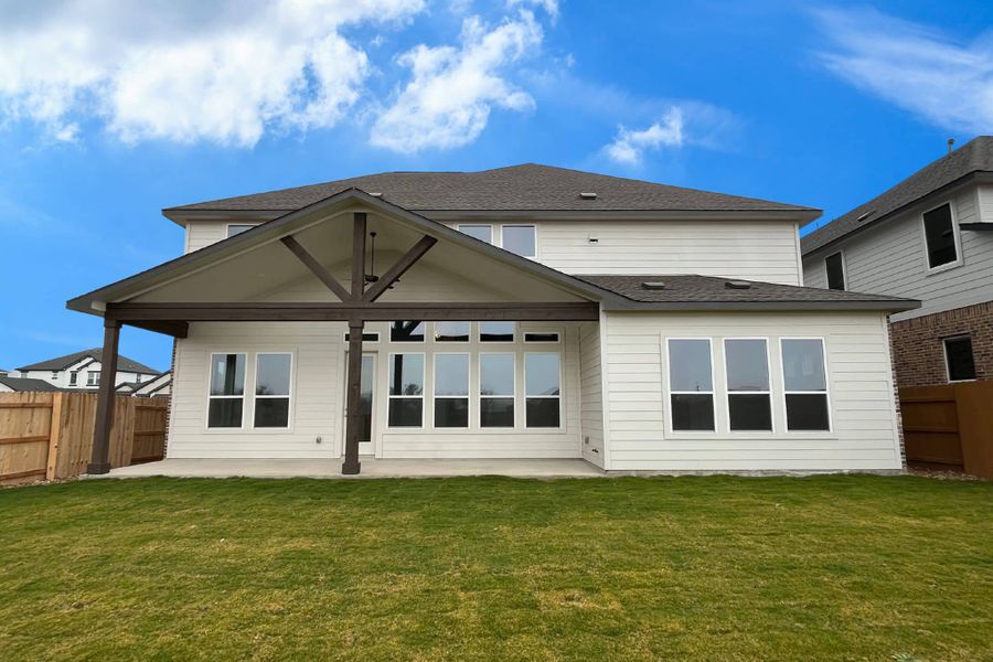 Exterior details and patio area of a home in Enclave At Cele, Pflugerville (Image 3).