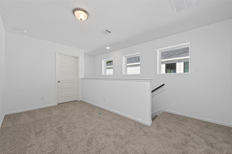 Spacious, unfurnished interior of a new home in Enclave at Willis, Willis (Image 32).