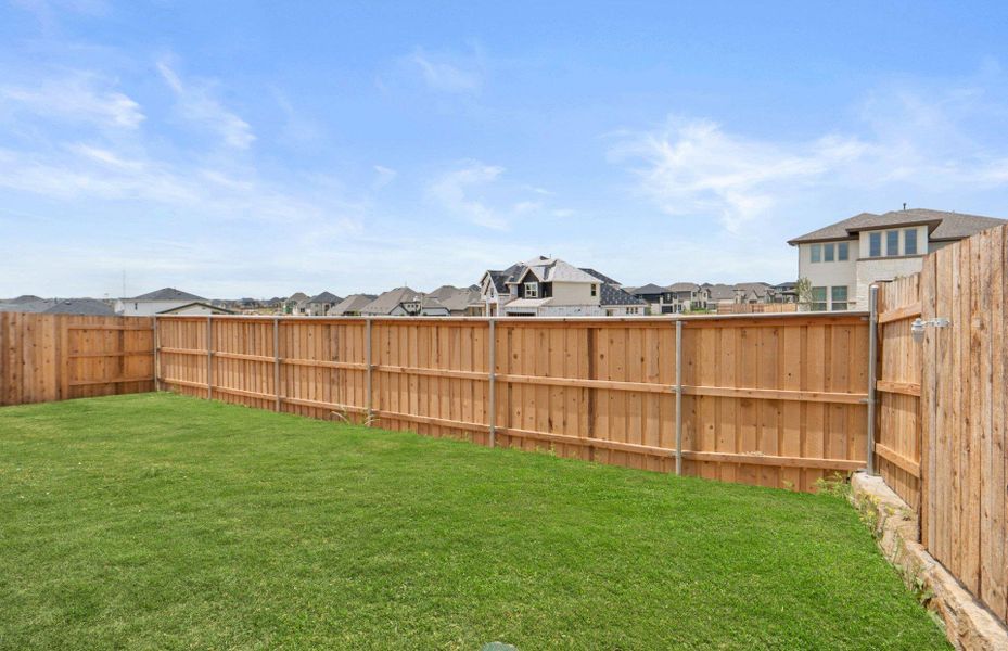 Exterior details and patio area of a home in Sunfield, Buda (Image 20).