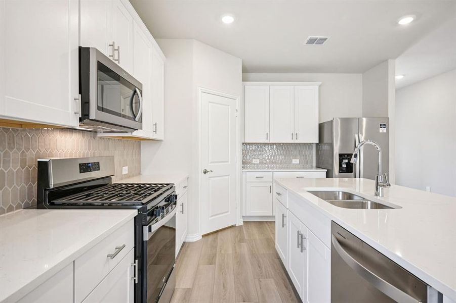 Furnished interior view inside a new home in Eastridge - Signature Series, McKinney (Image 9).