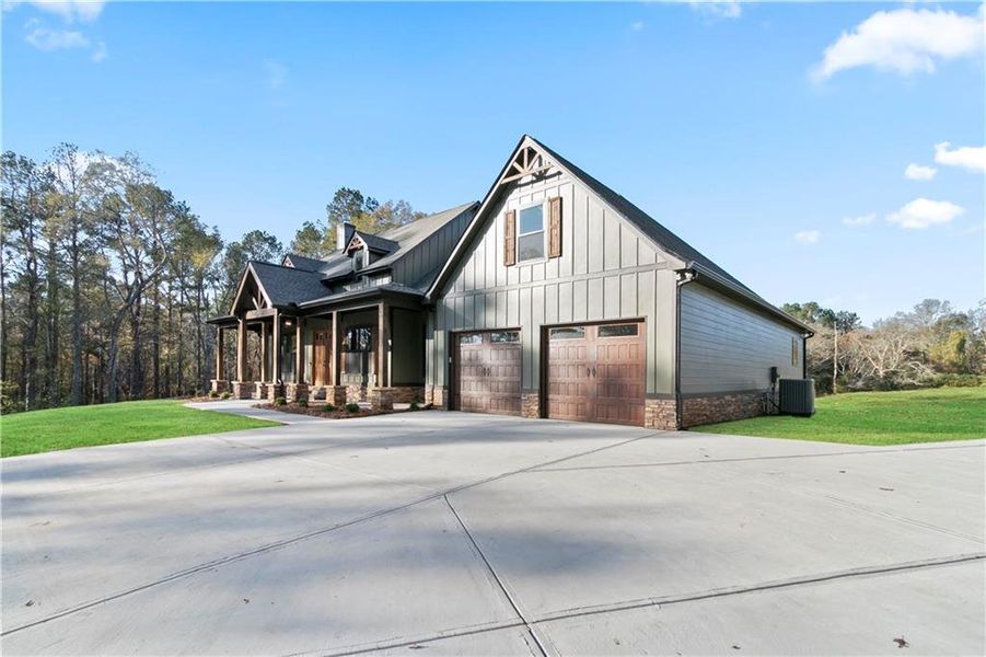 Front exterior of a new home in , Carrollton, GA, highlighting curb appeal (Image 21).