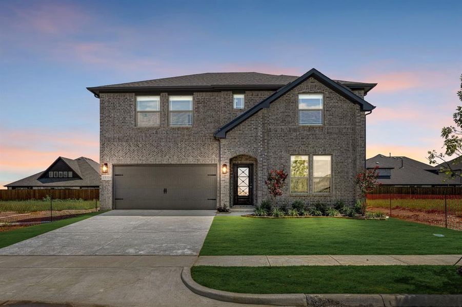 Front exterior of a new home in ArrowBrooke Elements, Aubrey, TX, highlighting curb appeal (Image 2). Front exterior of a new home in ArrowBrooke Elements, Aubrey, TX, highlighting curb appeal (Image 2).