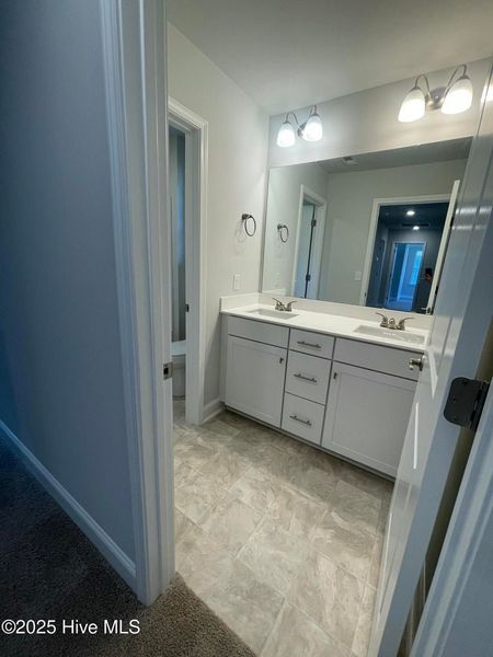 Furnished interior view inside a new home in Mill Creek Cove, Bolivia (Image 9).