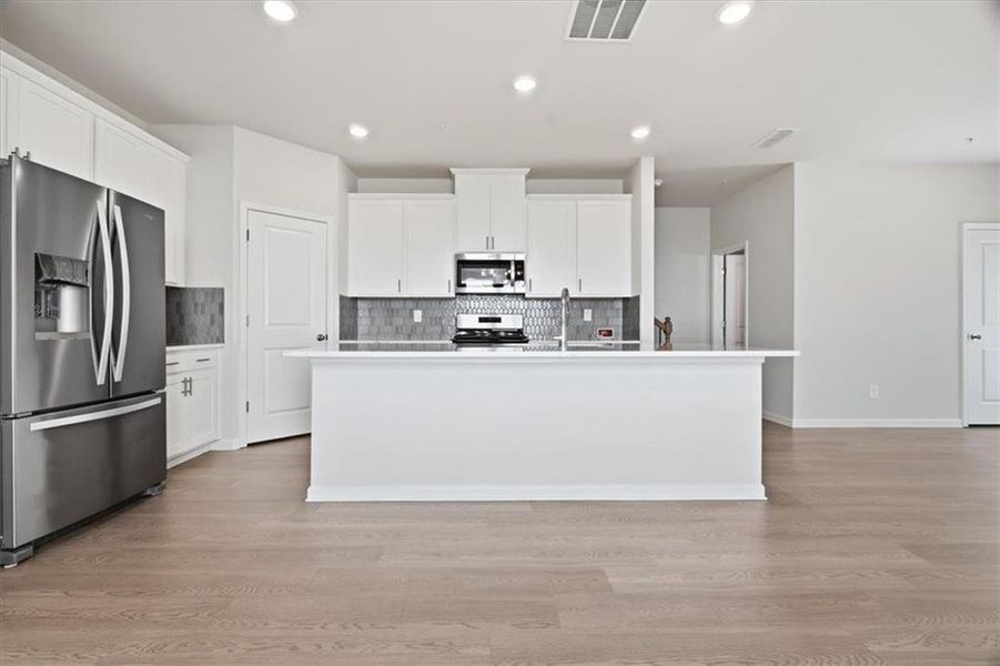 Furnished interior view inside a new home in Brooks at Riverview Landing, Smyrna (Image 9).