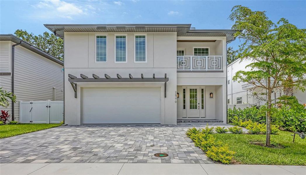 Front exterior of a new home in , Sarasota, FL, highlighting curb appeal (Image 23). Front exterior of a new home in , Sarasota, FL, highlighting curb appeal (Image 23).
