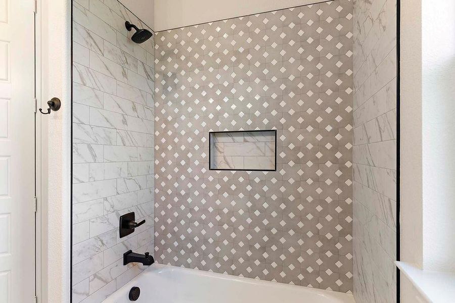 Full bathroom with shower / tub combination