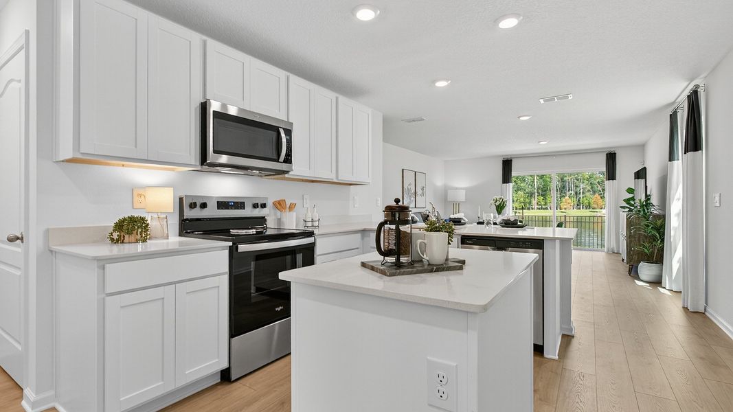 Furnished interior in a model home at Trout River in Jacksonville (Image 13).