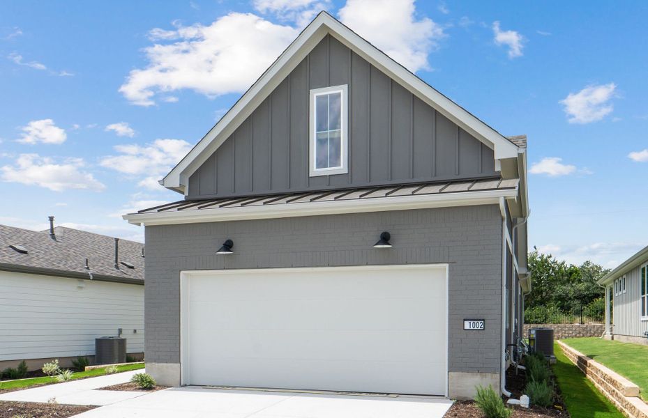 Front exterior of a new home in Sun City Texas, Georgetown, TX, highlighting curb appeal (Image 19). Front exterior of a new home in Sun City Texas, Georgetown, TX, highlighting curb appeal (Image 19).