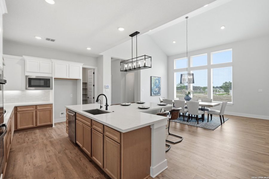 Furnished interior view inside a new home in Potranco Oaks, Castroville (Image 32).