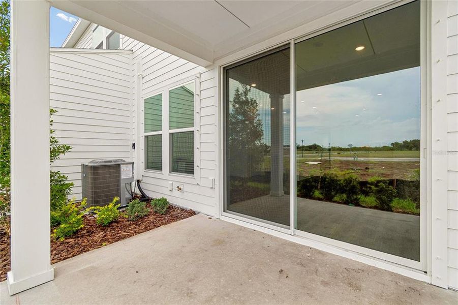 Exterior details and patio area of a home in Waterset Townhomes, Apollo Beach (Image 3). Exterior details and patio area of a home in Waterset Townhomes, Apollo Beach (Image 3).