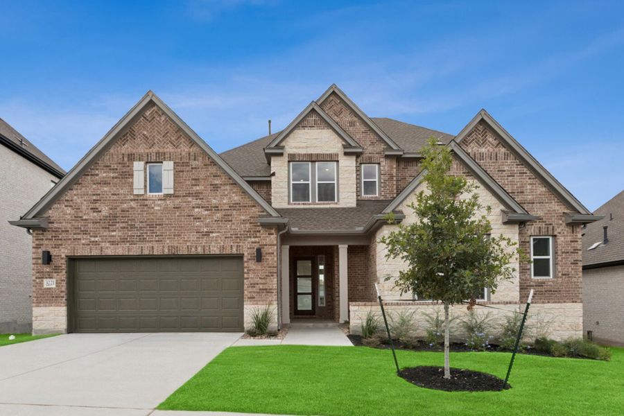 Front exterior of a new home in Wolf Ranch – West Bend, Georgetown, TX, highlighting curb appeal (Image 27).