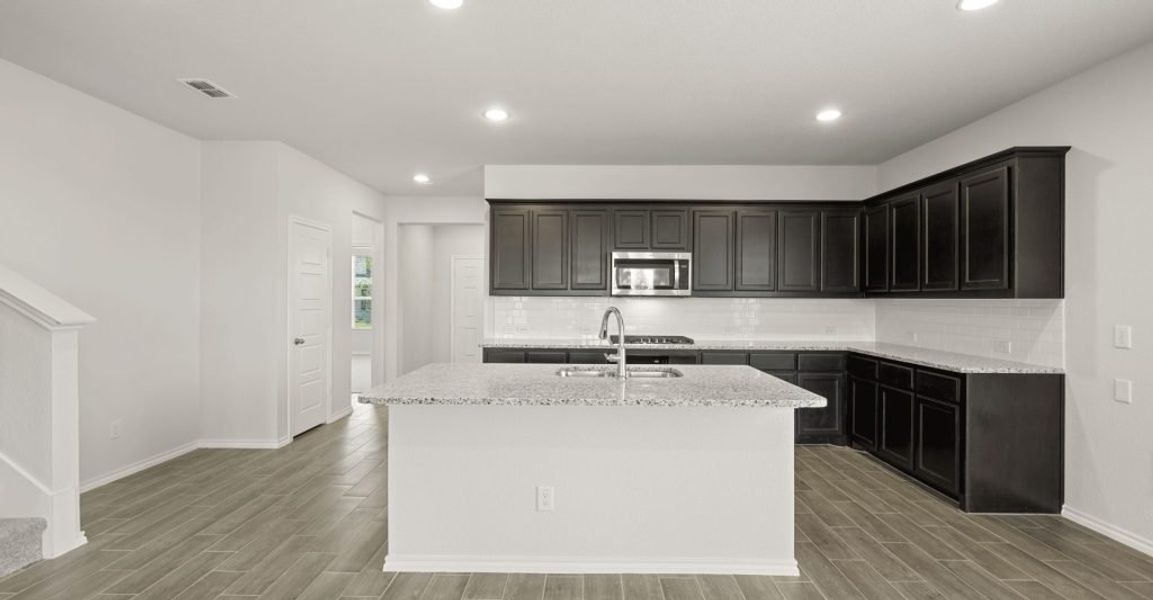 Representative exterior photo of a completed home built from the Brewer by Impression Homes in Redden Farms, Midlothian, TX (Image 7). Representative exterior photo of a completed home built from the Brewer by Impression Homes in Redden Farms, Midlothian, TX (Image 7).