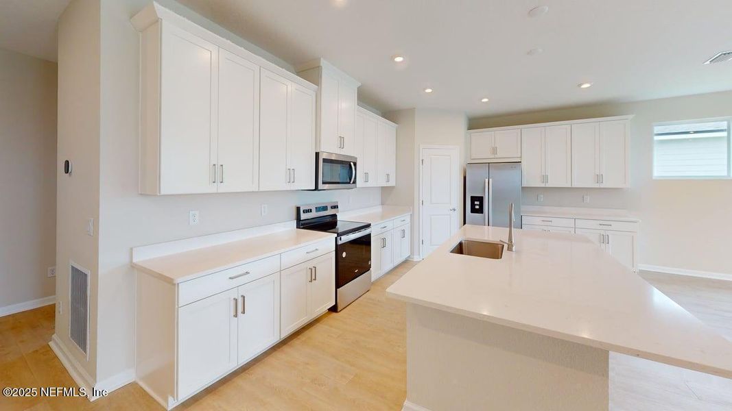 Furnished interior view inside a new home in Lakes at Bella Lago, Green Cove Springs (Image 8).