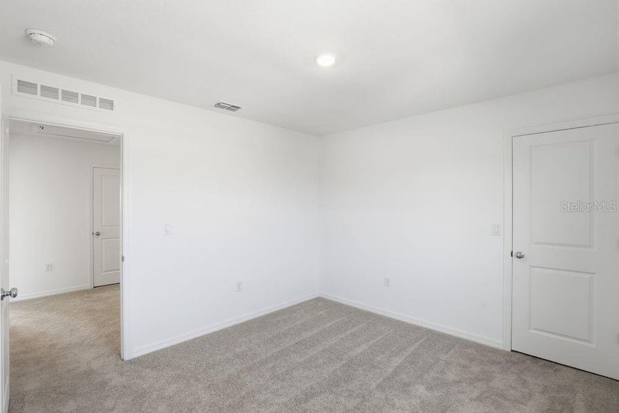 Spacious, unfurnished interior of a new home in Waterstone, Groveland (Image 34). Spacious, unfurnished interior of a new home in Waterstone, Groveland (Image 34).