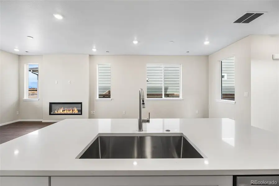Furnished interior view inside a new home in Barefoot Village, Firestone (Image 6).