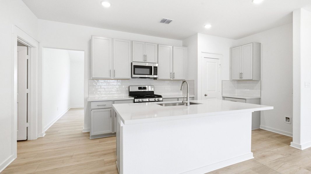 Furnished interior view inside a new home in Infinity Square, Kyle (Image 11).