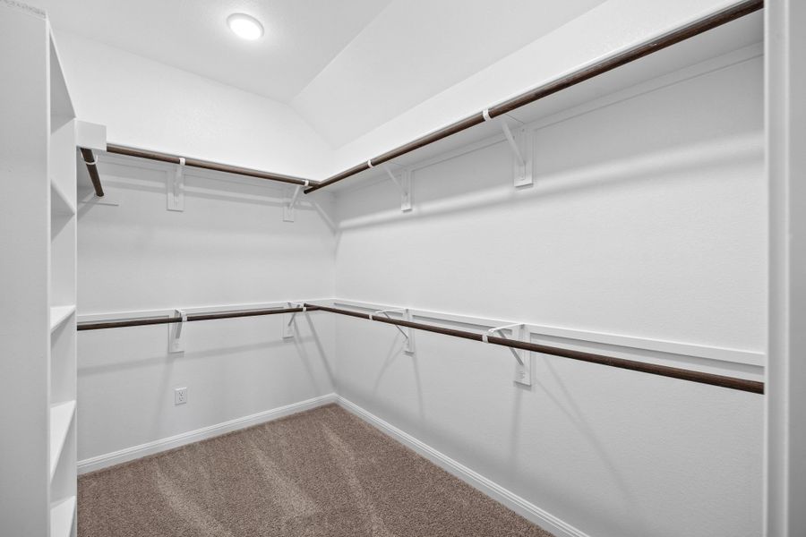 Primary Closet in the Spruce home plan by Trophy Signature Homes - REPRESENTATIVE PHOTO Primary Closet in the Spruce home plan by Trophy Signature Homes - REPRESENTATIVE PHOTO