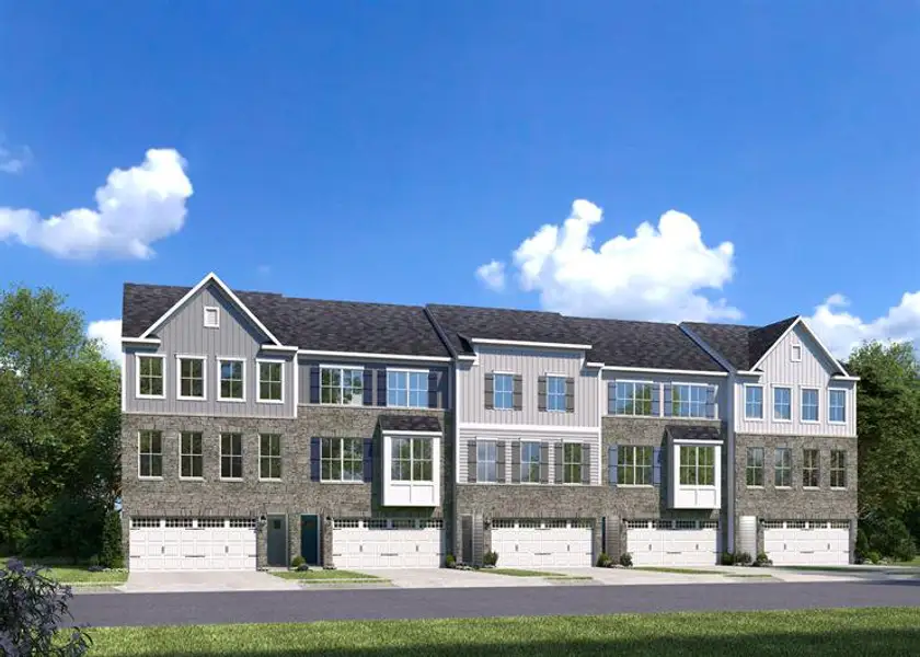 Front exterior of a home in the Townes at The Station community, located in Apex, NC (Image 2).