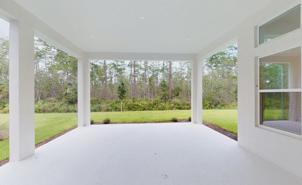 Exterior details and patio area of a home in Woodhaven, Port Orange (Image 17).