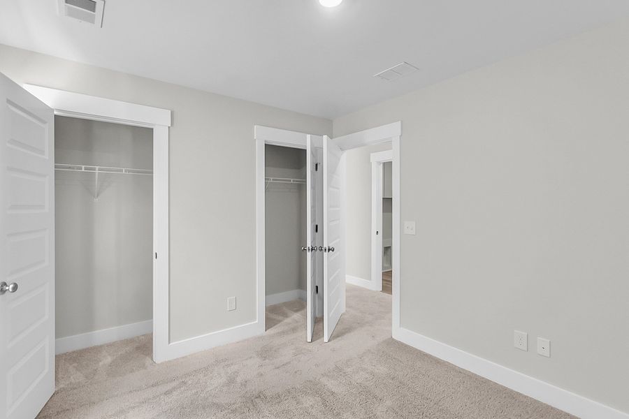 Spacious, unfurnished interior of a new home in Pineland Preserve, Summerville (Image 49).