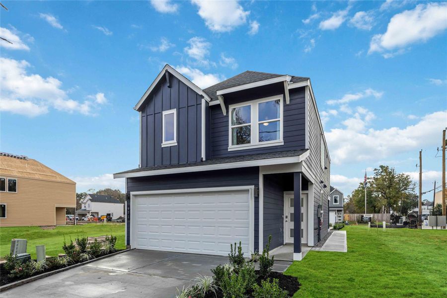 Front exterior of a new home in Highland Court, Houston, TX, highlighting curb appeal (Image 27).