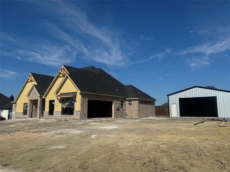 View of front of home with a garage plus 30x40 workshop