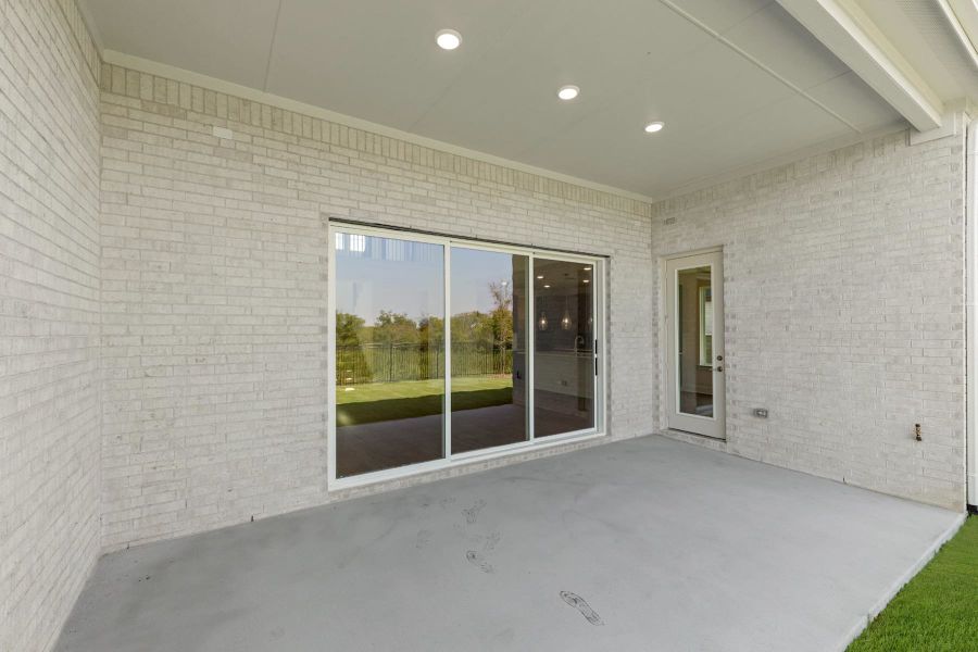 Exterior details and patio area of a home in Union Park, Little Elm (Image 4).