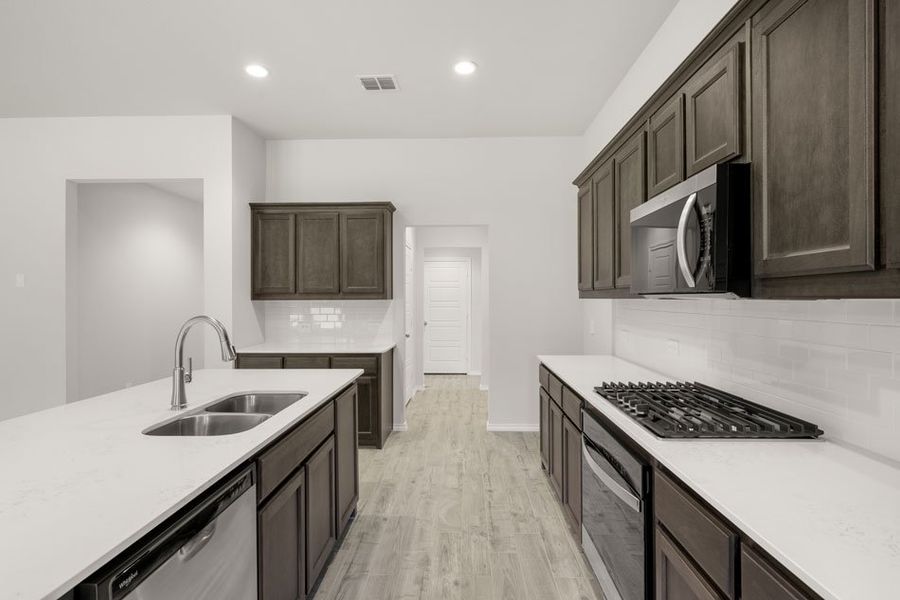 Front exterior of a new home in Stone Eagle, Azle, TX, highlighting curb appeal (Image 21). Front exterior of a new home in Stone Eagle, Azle, TX, highlighting curb appeal (Image 21).