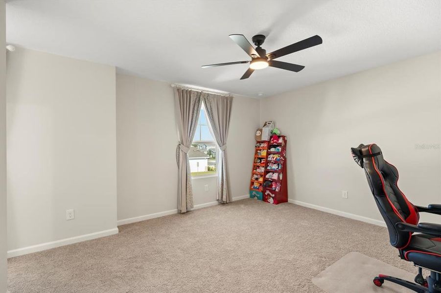 Furnished interior view inside a new home in Seasons at Lakeside Forest, Tavares (Image 30).
