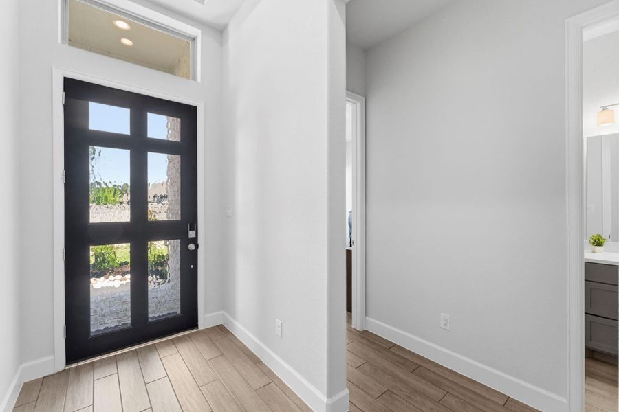 Just off the Entry are the 2 Secondary Bedrooms and Bathroom, Split away from Primary Suite for Privacy Just off the Entry are the 2 Secondary Bedrooms and Bathroom, Split away from Primary Suite for Privacy
