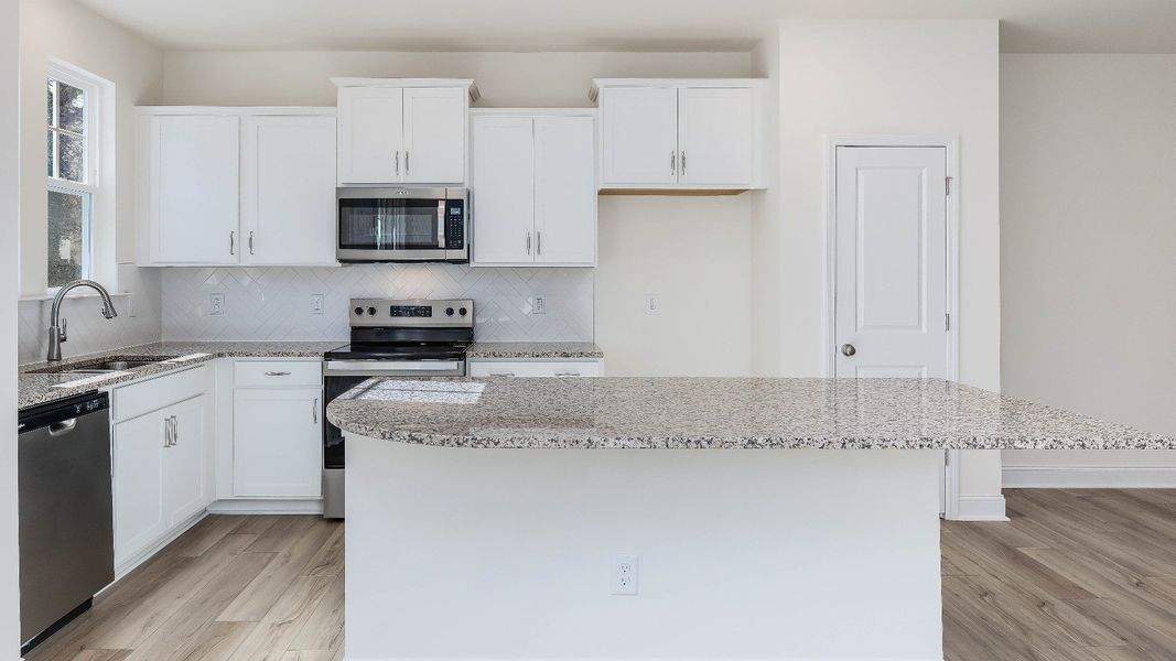 Furnished interior view inside a new home in Battle Bridge, Raleigh (Image 6).