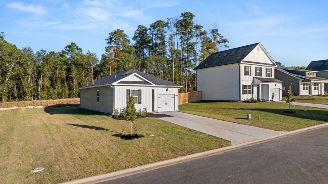Front exterior of a new home in Bellemeade Landing, Augusta, GA, highlighting curb appeal (Image 17). Front exterior of a new home in Bellemeade Landing, Augusta, GA, highlighting curb appeal (Image 17).