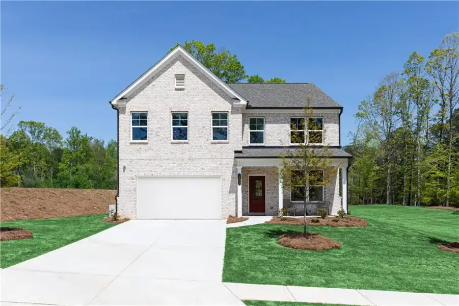 Front exterior of a new home in Croftside Single Family Homes, Powder Springs, GA, highlighting curb appeal (Image 2). Front exterior of a new home in Croftside Single Family Homes, Powder Springs, GA, highlighting curb appeal (Image 2).