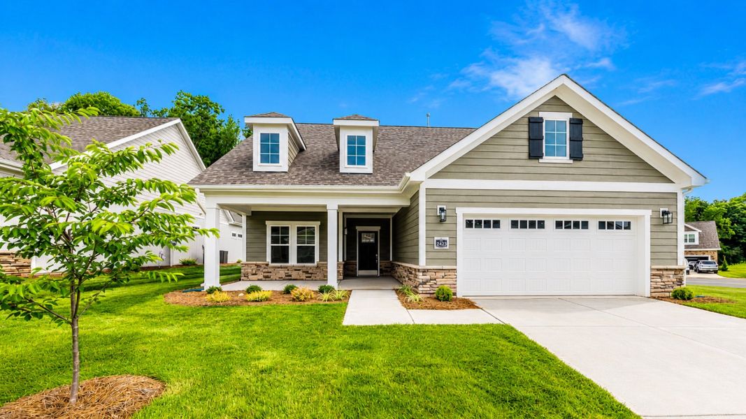 Front exterior of a new home in The Villas at Pinewood, Asheboro, NC, highlighting curb appeal (Image 1). Front exterior of a new home in The Villas at Pinewood, Asheboro, NC, highlighting curb appeal (Image 1).