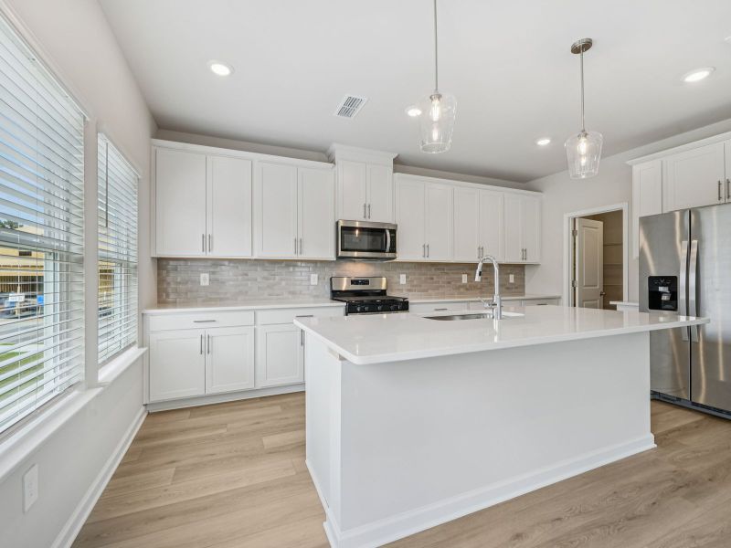 Furnished interior view inside a new home in Northwoods at Mirror Lake, Villa Rica (Image 6).