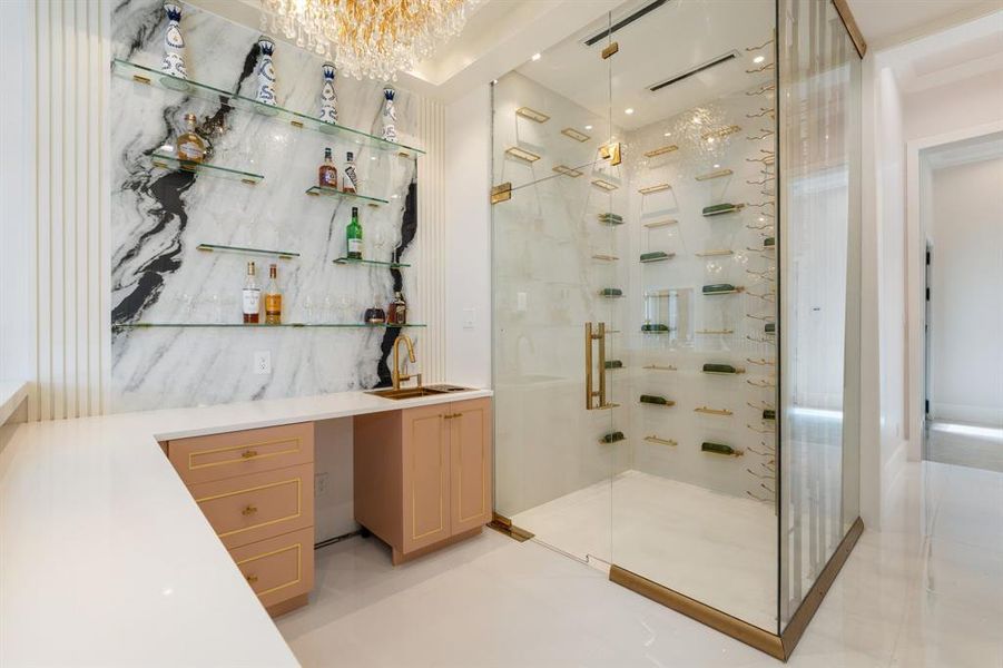 Glass-enclosed wine room that is sure to impress guests and make entertaining a breeze.