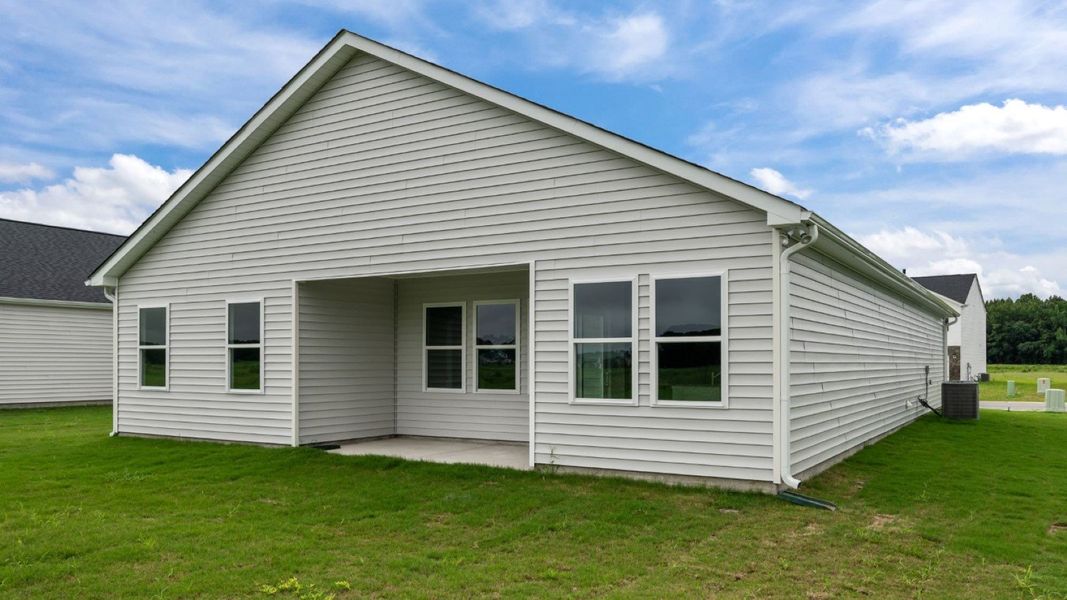 Front exterior of a new home in East Ridge, Ayden, NC, highlighting curb appeal (Image 18).
